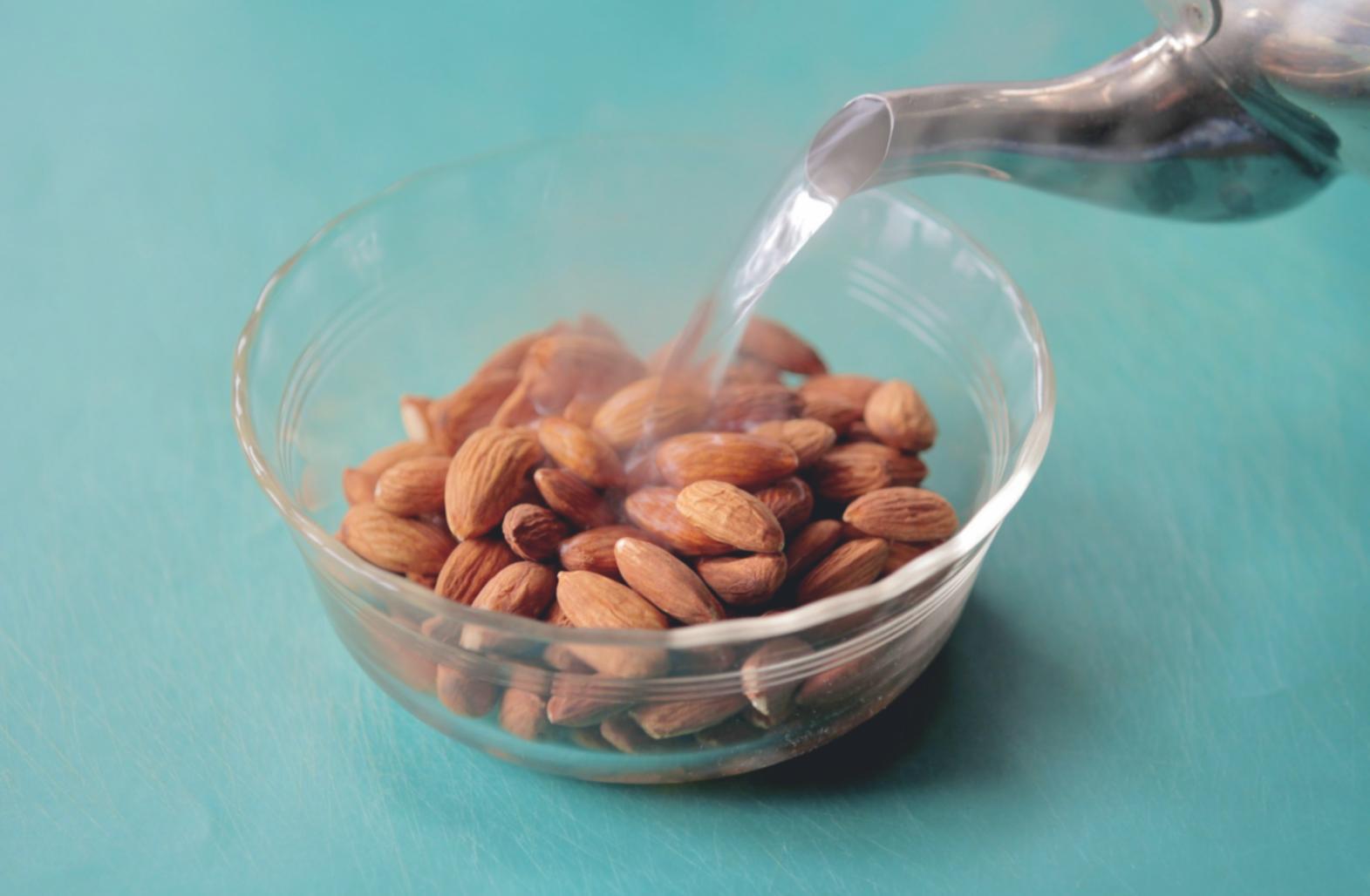 Fresh ingredients and cooking essentials arranged on a rustic wooden table